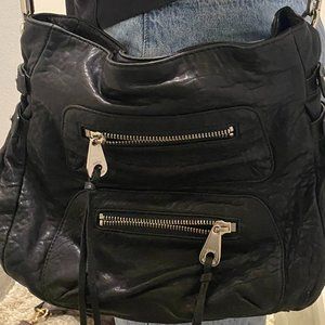 Joelle Hawkens black hobo bag